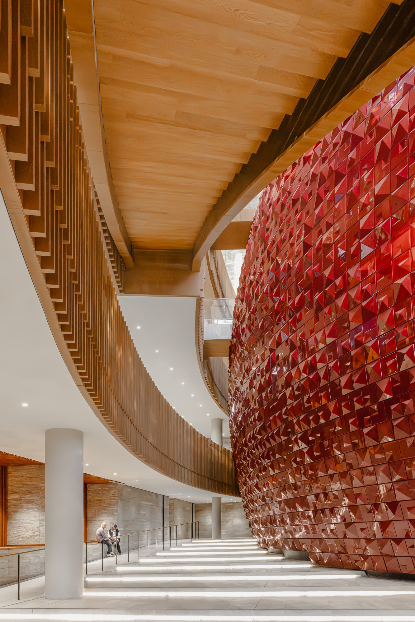 Grand stair between the red drum and curving oak balconies, AKM