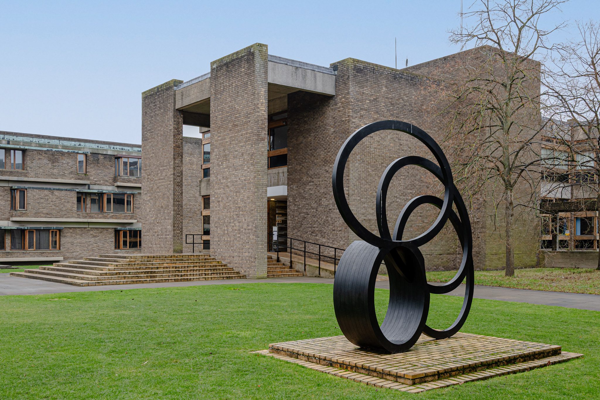 Ring sculpture on the lawn before the brick courts, Churchill College
