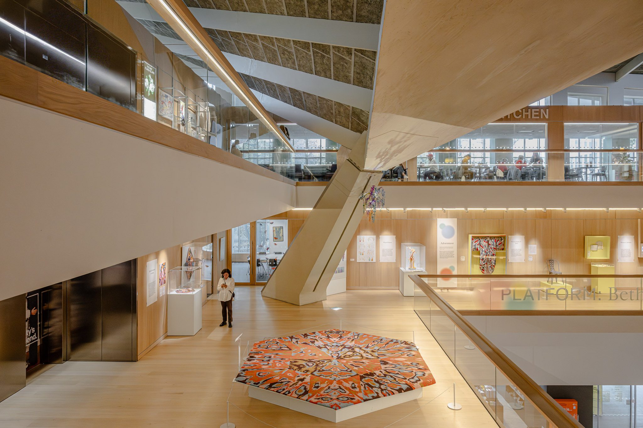 Atrium with a hexagonal carpet installation seen from above, Design Museum