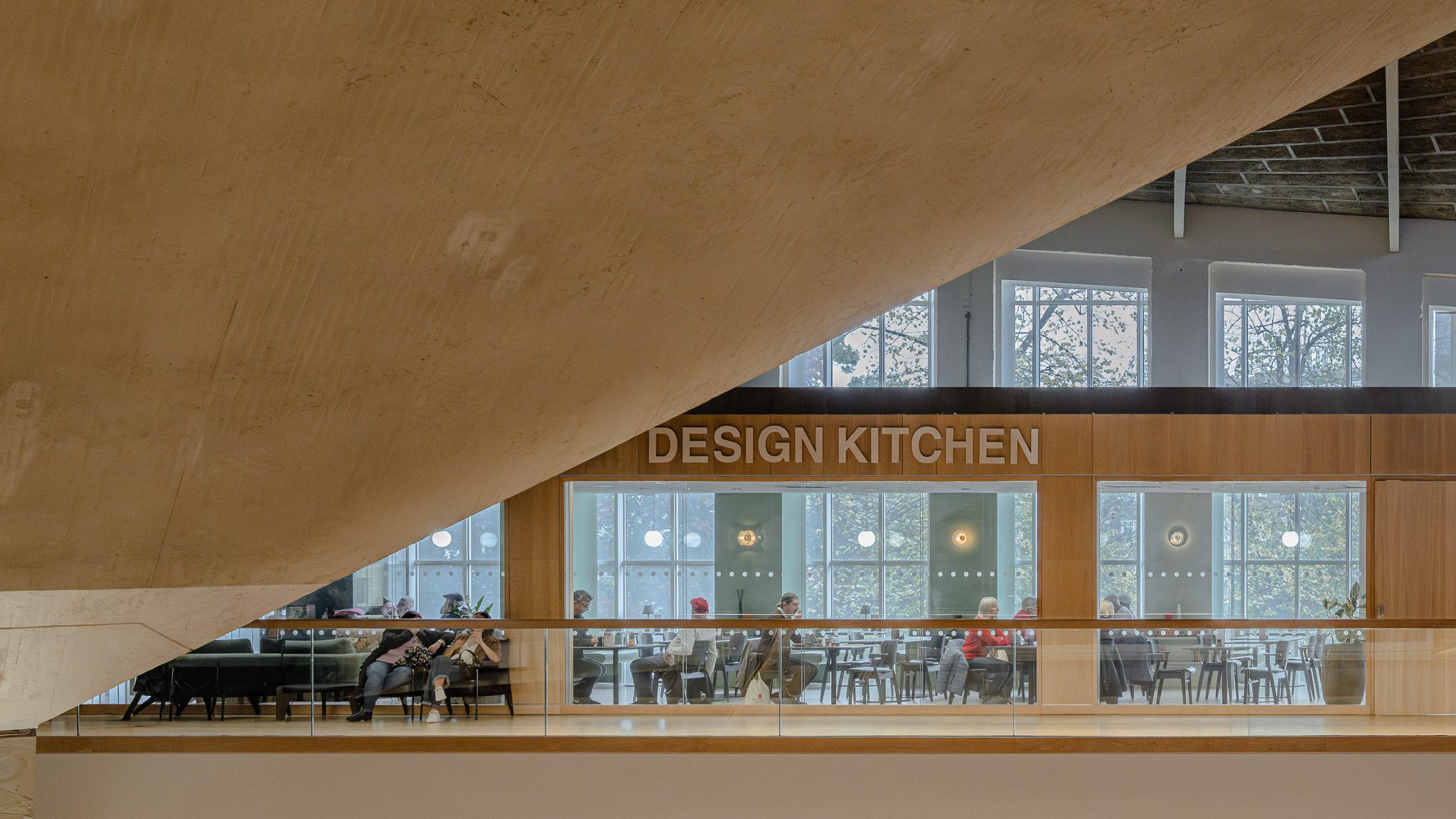 Design Kitchen café seen across the atrium beneath the roof
