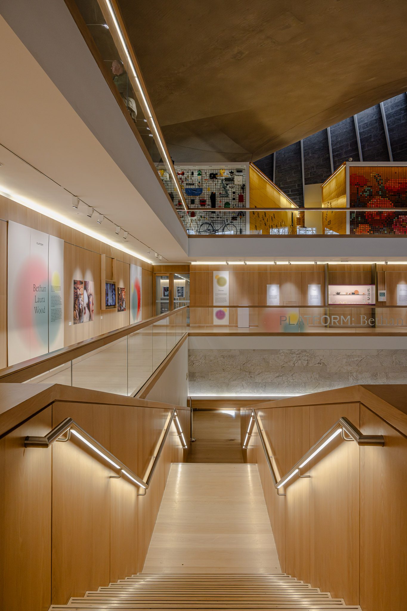 Oak stair framed by angled handrails, Design Museum