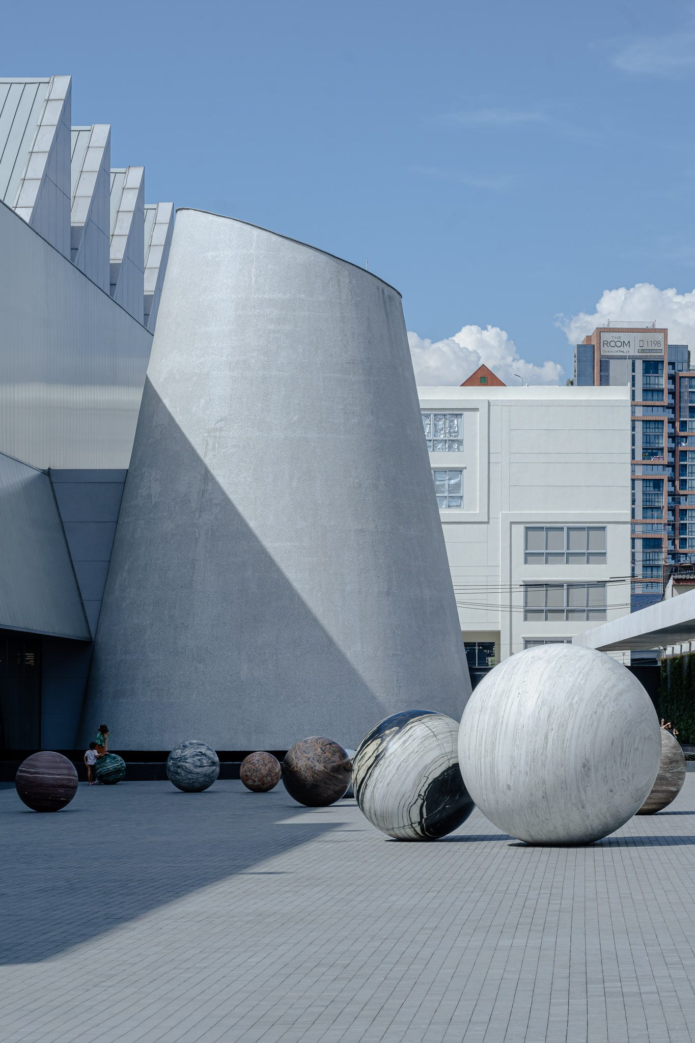 Cone-shaped Chapel and marble spheres in the courtyard, Dib Bangkok