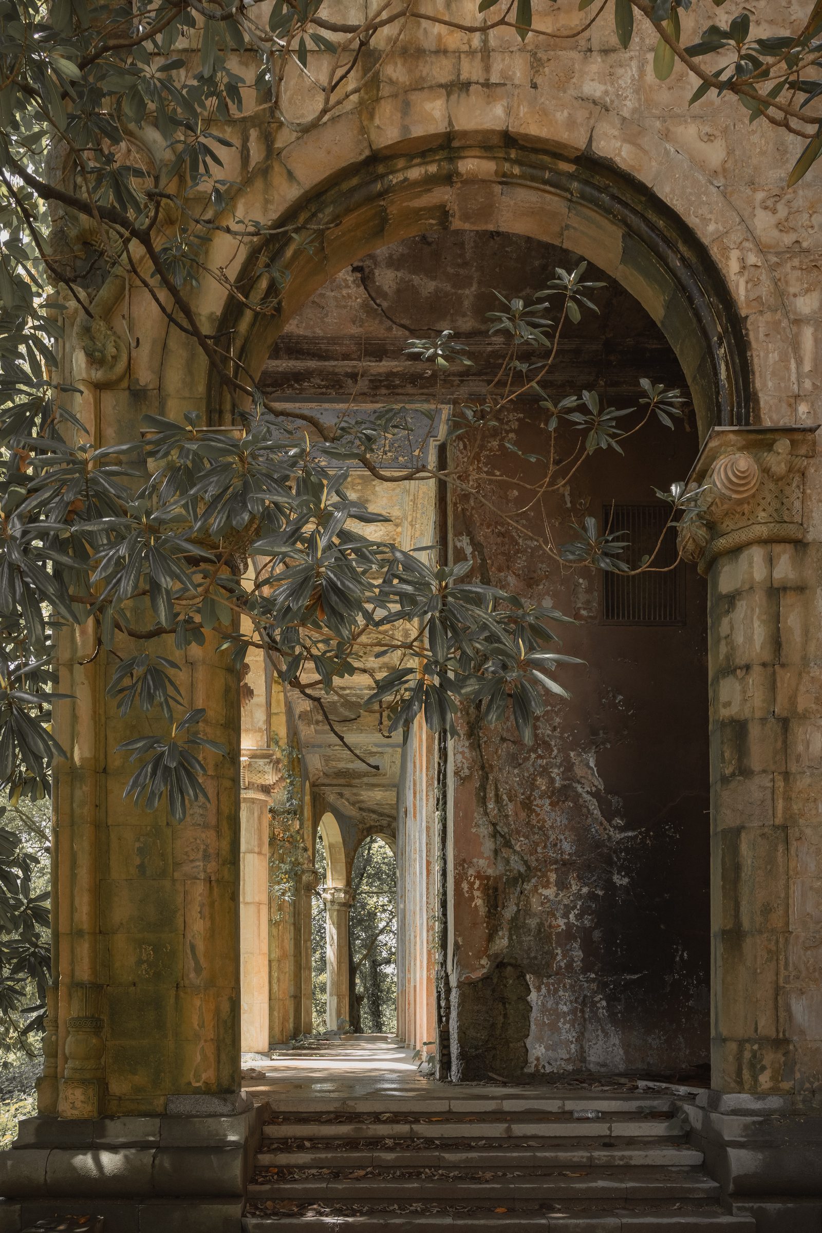Overgrown arched colonnade at Sanatorium Metallurgist, Tskaltubo
