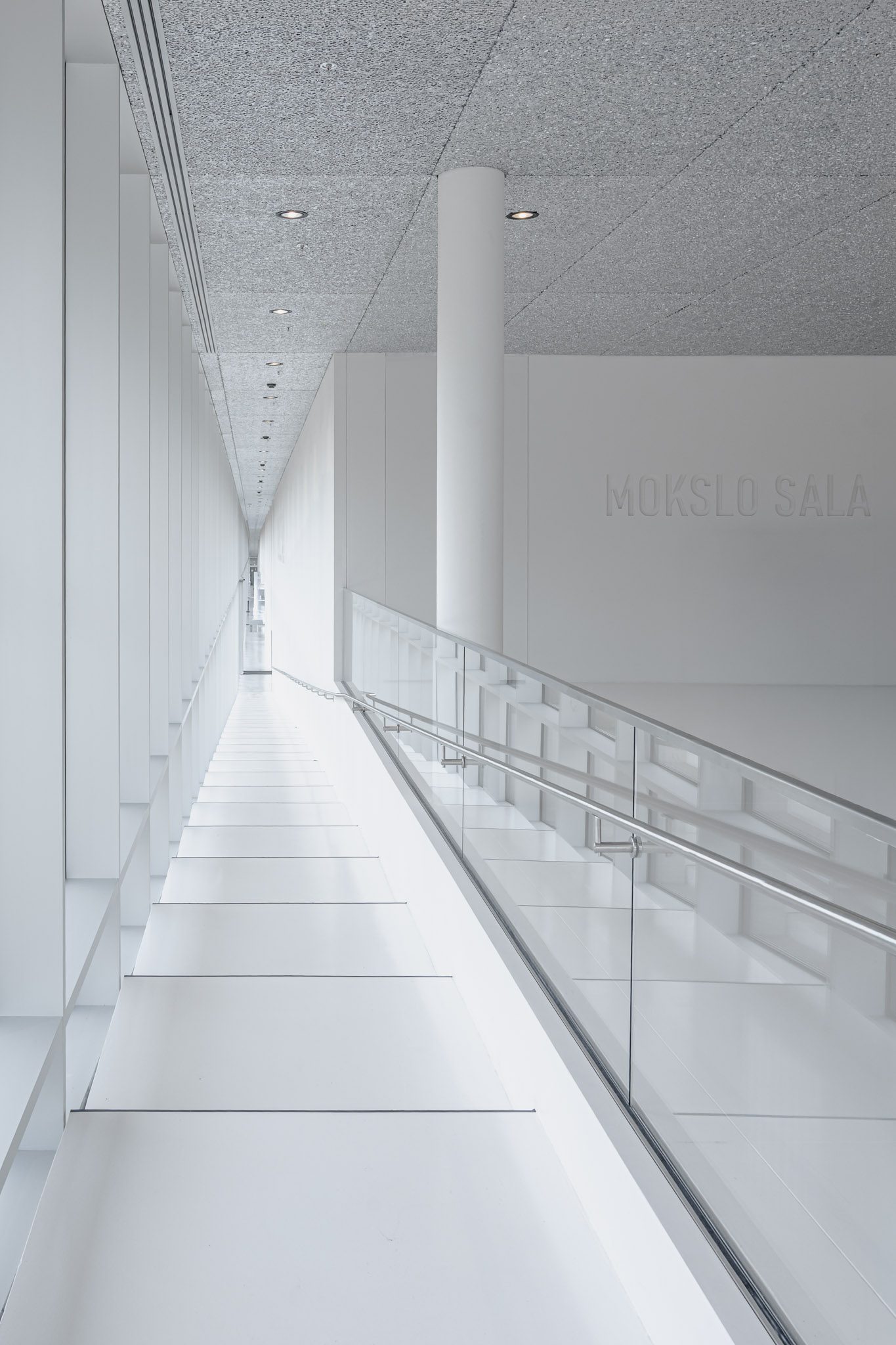 White ramp along a glazed gallery, Mokslo Sala